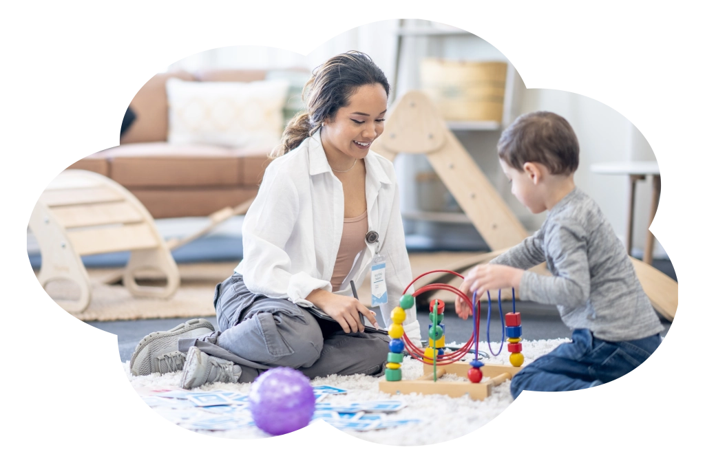 Child and therapist during ABA session at Inspire Center for Autism in Mesa, Arizona